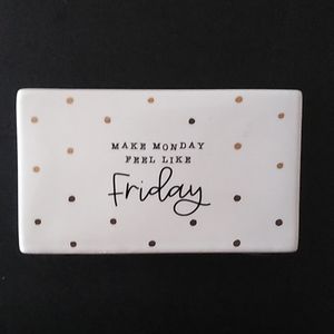 "Make Monday Feel Like Friday" sign